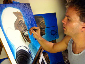 The artist painting the Obama paintings